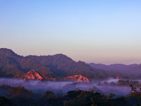 View of the misty mountains of Nhila in Teknaf at sunrise, with lush green hills and soft morning light in Cox's Bazar, Chittagong Division, Bangladesh.