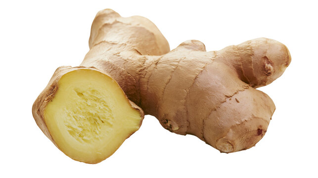 Ginger root with one half sliced showing fibrous yellow flesh