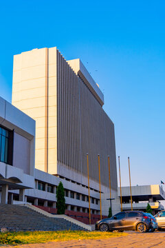 Lusaka, Zambia - 01 July 2026: View of the Bank of Zambia building featuring a tall, modern facade with vertical lines and a clear blue sky in the background.