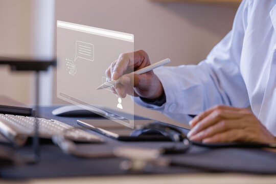 Doctor using digital interface and stylus for online medical communication in a modern clinic healthcare technology