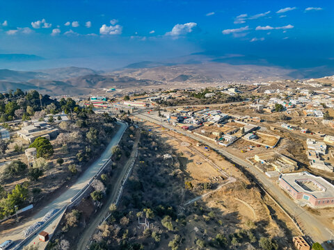 Aerial view of Fort Monroe, a historic hill station in the Sulaiman Mountains, featuring winding roads and scattered buildings in Fort Monroe, Punjab, Pakistan.