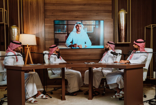 Arab men having video conference group conversation.