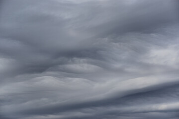Obraz premium Natural backgrounds and textures. A striking background of gray stratus clouds.