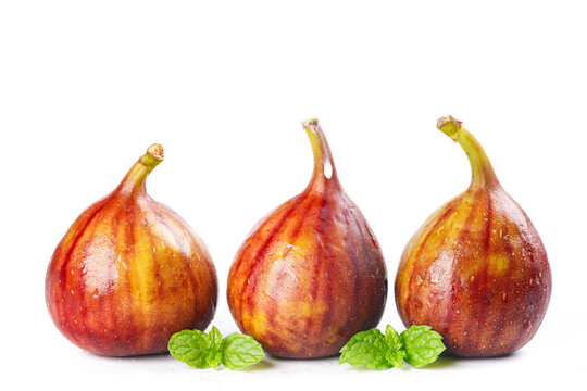 Fresh Yunnan Figs with Red Yellow Skin and Mint Leaves on White Background