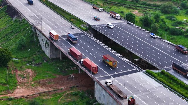 Scenic Drone View Following a Truck on the Delhi&ndash;Mumbai Expressway, Multi-Lane Highway, Smooth Traffic Flow, Modern Road Infrastructure, Golden Light and Cinematic Highway Journey