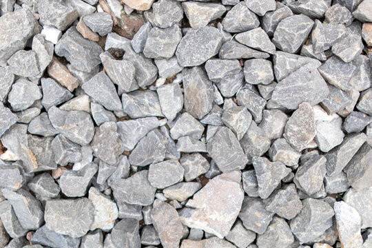 Full frame view of crushed grey gravel stones and rocks