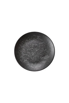 An empty round ceramic plate on a dark, textured brown background. An empty round plate