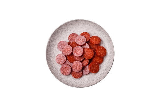 Slices of smoked pepperoni or salami for making homemade pizza. Sliced pepperoni