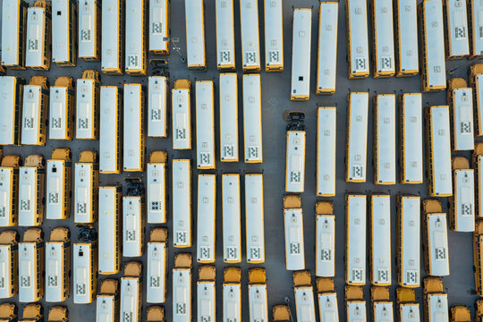 Aerial view of rows of yellow school buses parked in a large lot in Las Vegas, Nevada, United States.