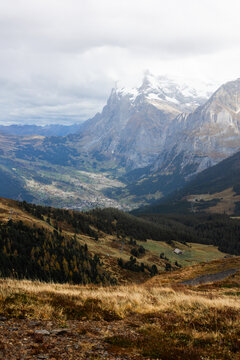 View of Kleine Scheidegg overlooking the valley and snow-capped mountains in Lauterbrunnen, Canton of Bern, Switzerland.