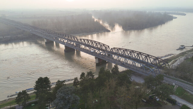Aerial view of the metal truss bridge spanning the Po River in Cremona, Lombardy, Italy.