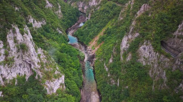 Majestic aerial view of the steep forested cliffs along Piva River canyon near Montenegro and Bosnia border
