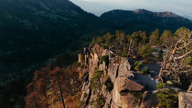 Dried Forest Surrounding The Rugged Rocky Summit Of Nevado de Colima In Mexico. Aerial Drone Shot