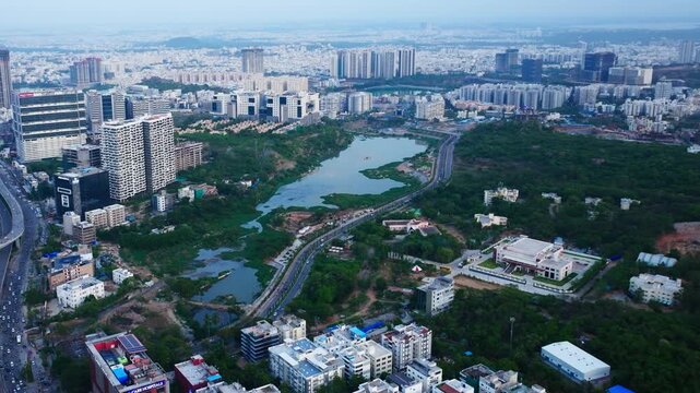 Engineering Staff College of India with IEI ESCI Centenary Convention Centre, skyscraper and Khajaguda Talab at gachibowli, hyderabad, telangana, india. day time, static shot, drone shot, 4k.