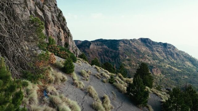 Steep Rugged Mountain Cliff With Rocky Layers At Nevado de Colima In Jalisco, Mexico. Aerial Shot