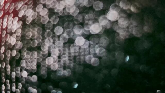 Abstract colorful background with soft bokeh lights and moving shapes