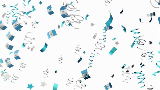 Colorful confetti and national flags fall from above to celebrate a special occasion in Guatemala. The festive display creates a lively atmosphere during the event