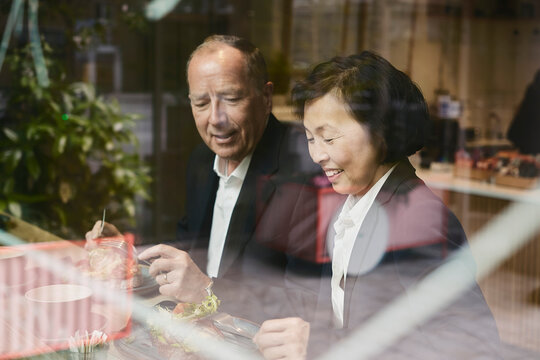 Business colleagues having a lunch meeting in a coffee shop