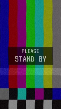 Classic television test pattern with colorful vertical bars and "PLEASE STAND BY" text. Retro TV Test Pattern Color Bars And Warning Text Please Stand By. 4K Video.