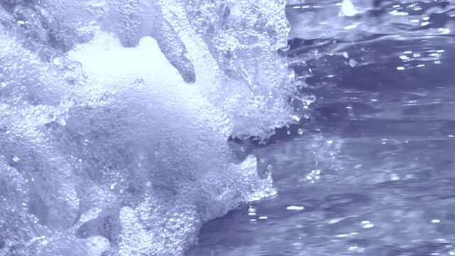Close-up ocean waves rolling and splashing with dynamic movement and natural blue water.