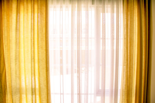 Morning light shine through the curtain in the morning, Flare light through the window, Landscape view from the window for relaxing time, window, peaceful place for take a rest in the morning