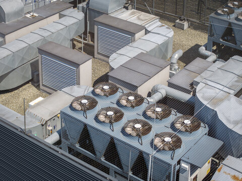 Aerial view of industrial cooling units and HVAC systems on the roof of an AI data center in Krakow, Lesser Poland Voivode, Poland.