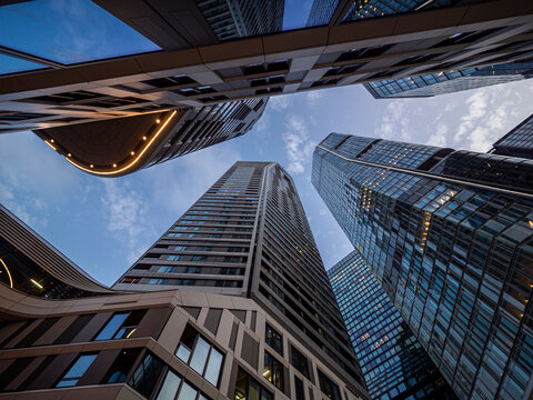Low angle view of modern architecture in Frankfurt at twilight