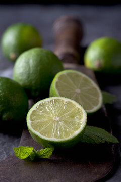 Limes with leaves and sickle, close up