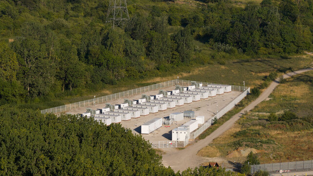 An aerial drone films a battery energy storage facility