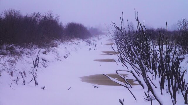 Snowfall, sludge ice. Sleet in early spring in northern Europe. Melted canals and lakes with rotten snow.