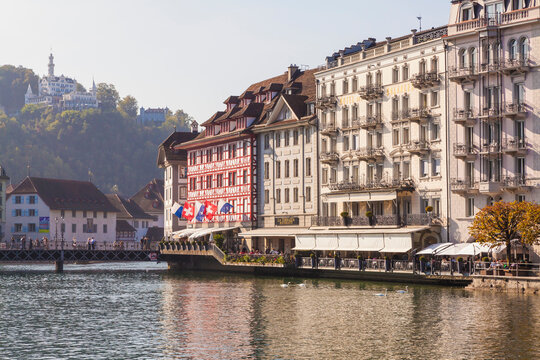 Switzerland, Luzern, hotels and outdoor gastronomy at riverside of Reuss