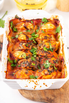 Viral Dump-and-Bake One Pan Dumpling Casserole. Tasty and simple Dumplings Bake Casserole recipe idea, made with frozen dumplings and tasty tomato sauce, fresh herbs and spices