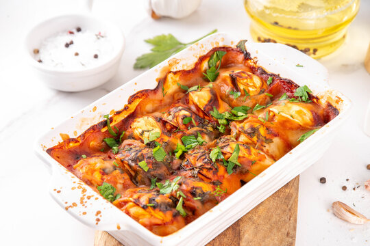 Viral Dump-and-Bake One Pan Dumpling Casserole. Tasty and simple Dumplings Bake Casserole recipe idea, made with frozen dumplings and tasty tomato sauce, fresh herbs and spices