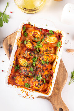 Viral Dump-and-Bake One Pan Dumpling Casserole. Tasty and simple Dumplings Bake Casserole recipe idea, made with frozen dumplings and tasty tomato sauce, fresh herbs and spices