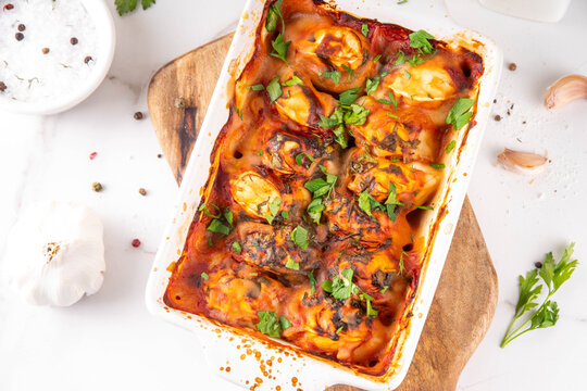 Viral Dump-and-Bake One Pan Dumpling Casserole. Tasty and simple Dumplings Bake Casserole recipe idea, made with frozen dumplings and tasty tomato sauce, fresh herbs and spices