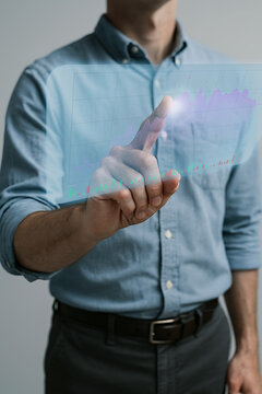 Close-up of a hand making a confident gesture in a business setting.