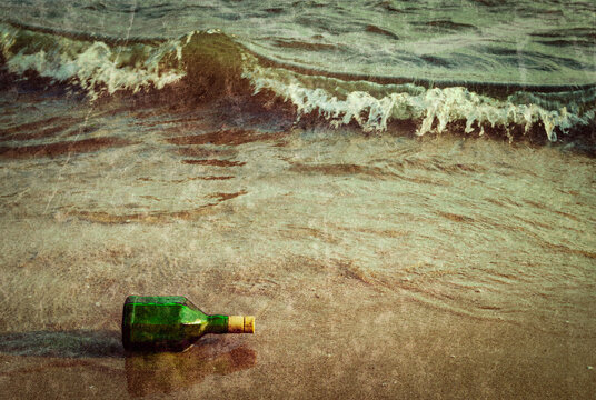 Vintage retro hipster style travel scene of message bottle on beach sand in waves with grunge texture overlaid