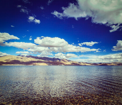 A vintage retro effect hipster style travel view of Himalayan lake in Himalayas Tso Moriri , Korzok, Changthang area, Ladakh, Jammu and Kashmir, India