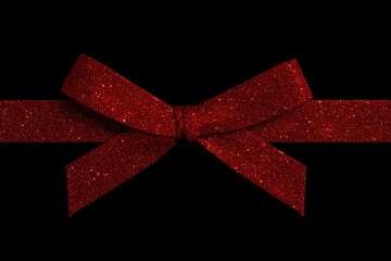 Naklejka premium Red glittery ribbon bow on a black background