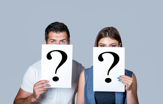 Couple holding paper question mark. Anonymous, man and woman question, incognita. Problems and solutions. Couple in quarrel. Quarrel between people. Problem in couple, question mark