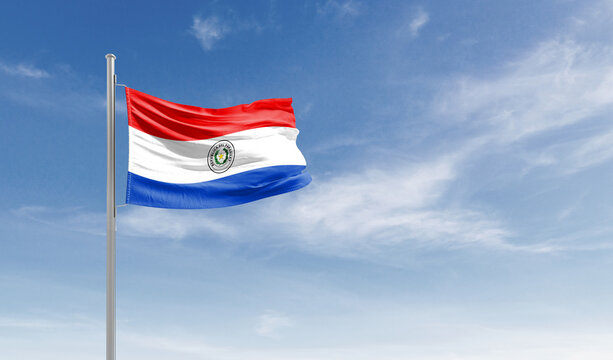 Paraguay national flag waving in the sky.