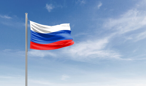 Russia national flag waving in the sky.