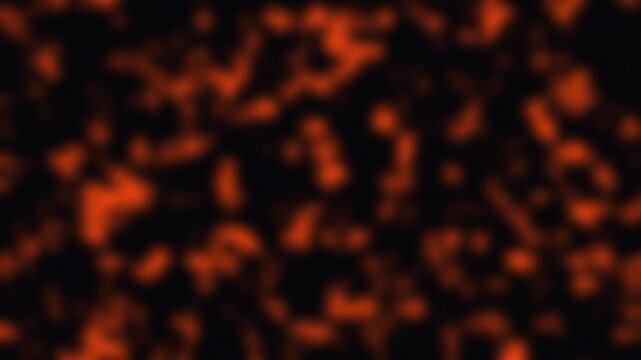 Orange particles abstract motion with black horizontal band during digital background creation