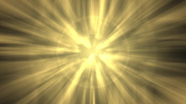 Golden sunburst light rays emanating from center during ethereal cosmic explosion motion background