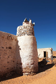 Ancient mosque in the small village in Sahara desert, Mauritania,
