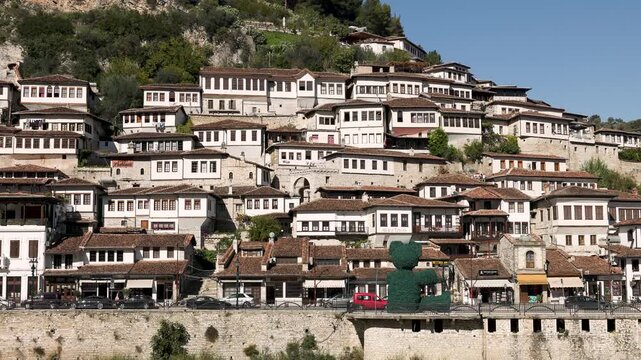 Historic white buildings with shingle roofs of Berat old town in Albania