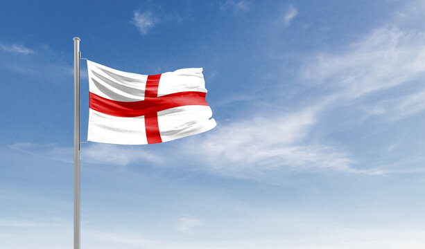 England national flag waving in the sky.