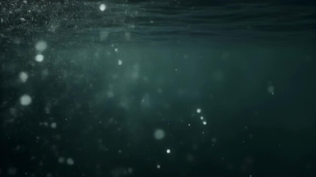 Bioluminescent plankton glowing in dark ocean water