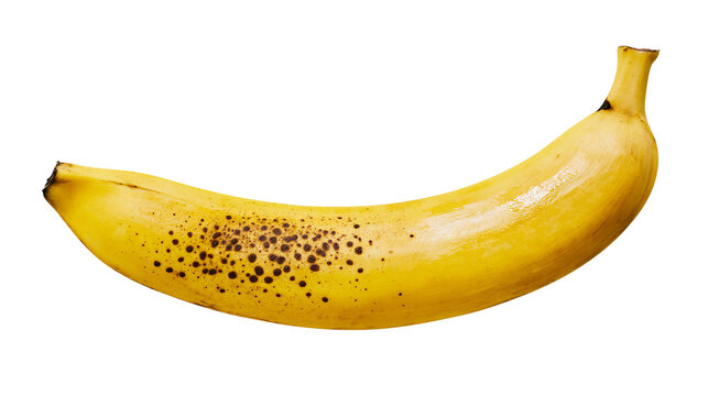 Ripe yellow banana with brown spots