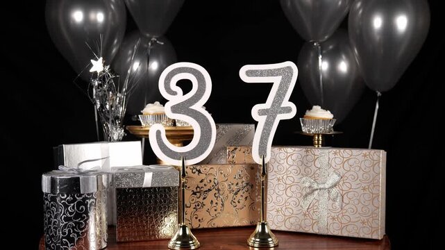 Silver Number 37 with Silver Glitter Sparkles with Gifts and Balloons and Cupcakes for Party Thirty Seven